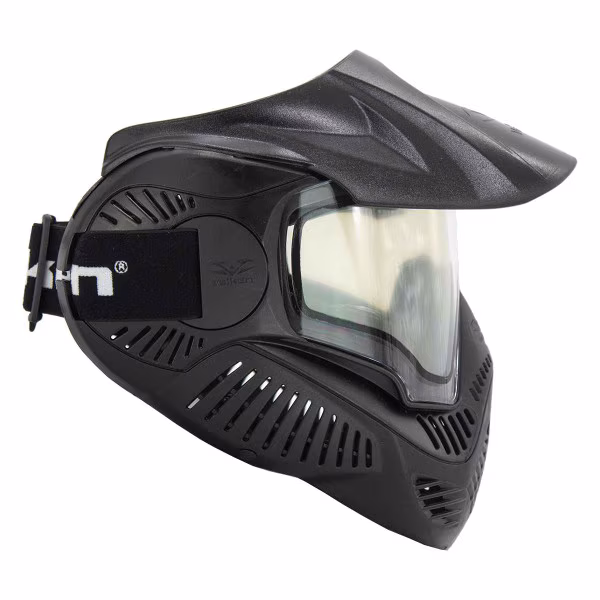 A black Valken MI-7 or similar paintball/airsoft goggle and mask, shown at a slight angle. The mask features a dark frame, integrated visor, and a reflective or clear lens.